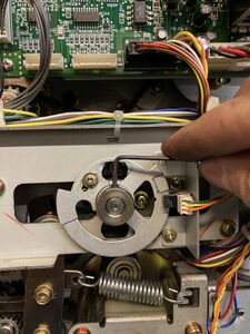 Using a 2mm set screw to tighten the p-disc in position for a B4/legal machine (with the notch centered on the 3:00 sensor).