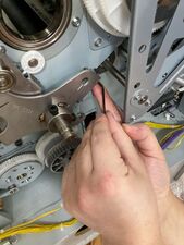 The right bolt can be hard to access, sometimes it is easier when turning the pressure lever counter-clockwise slightly.