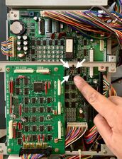 The drum free rotate button (for manually powering the main drive, if it is needed).